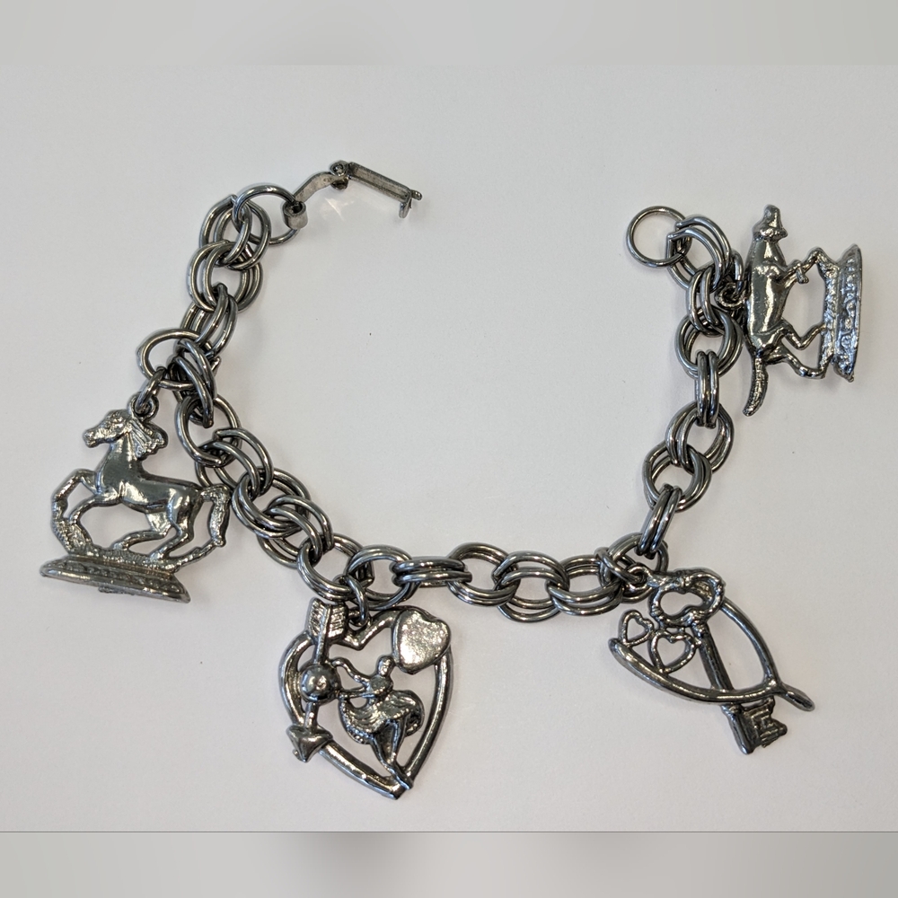 EVC SILVER TONE CHARM BRACELET